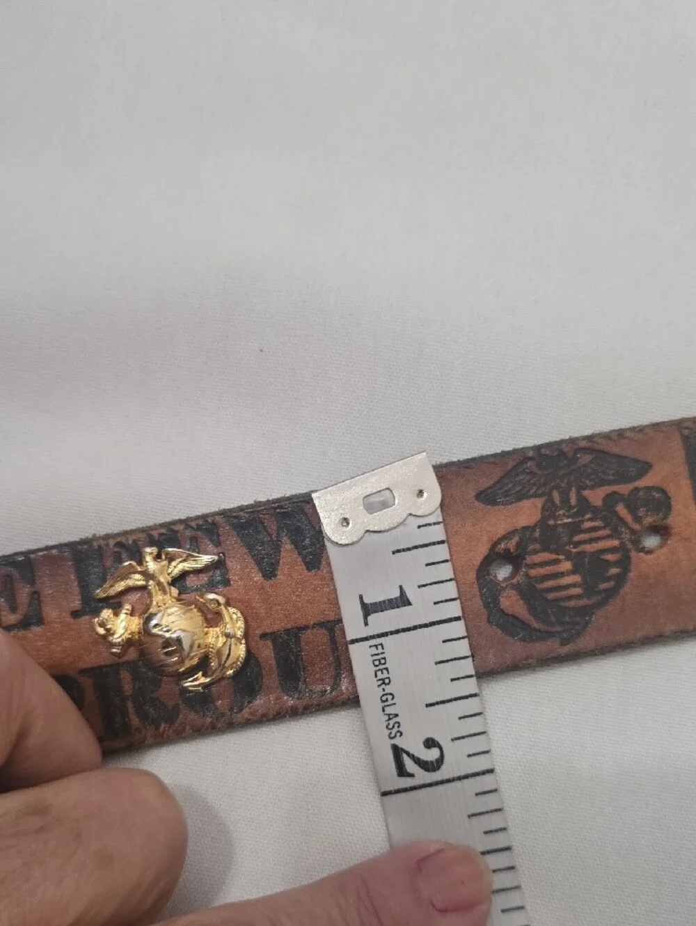Vintage Tan Leather Men's Belt with Embossed Text and Brass Accent